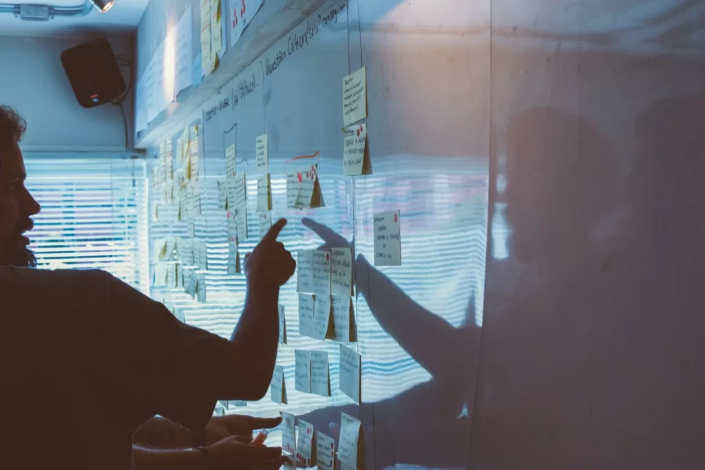 Team planning strategy with sticky notes